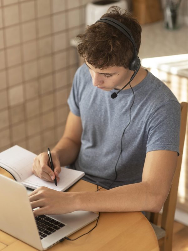 man-working-kitchen-home-quarantine-with-laptop